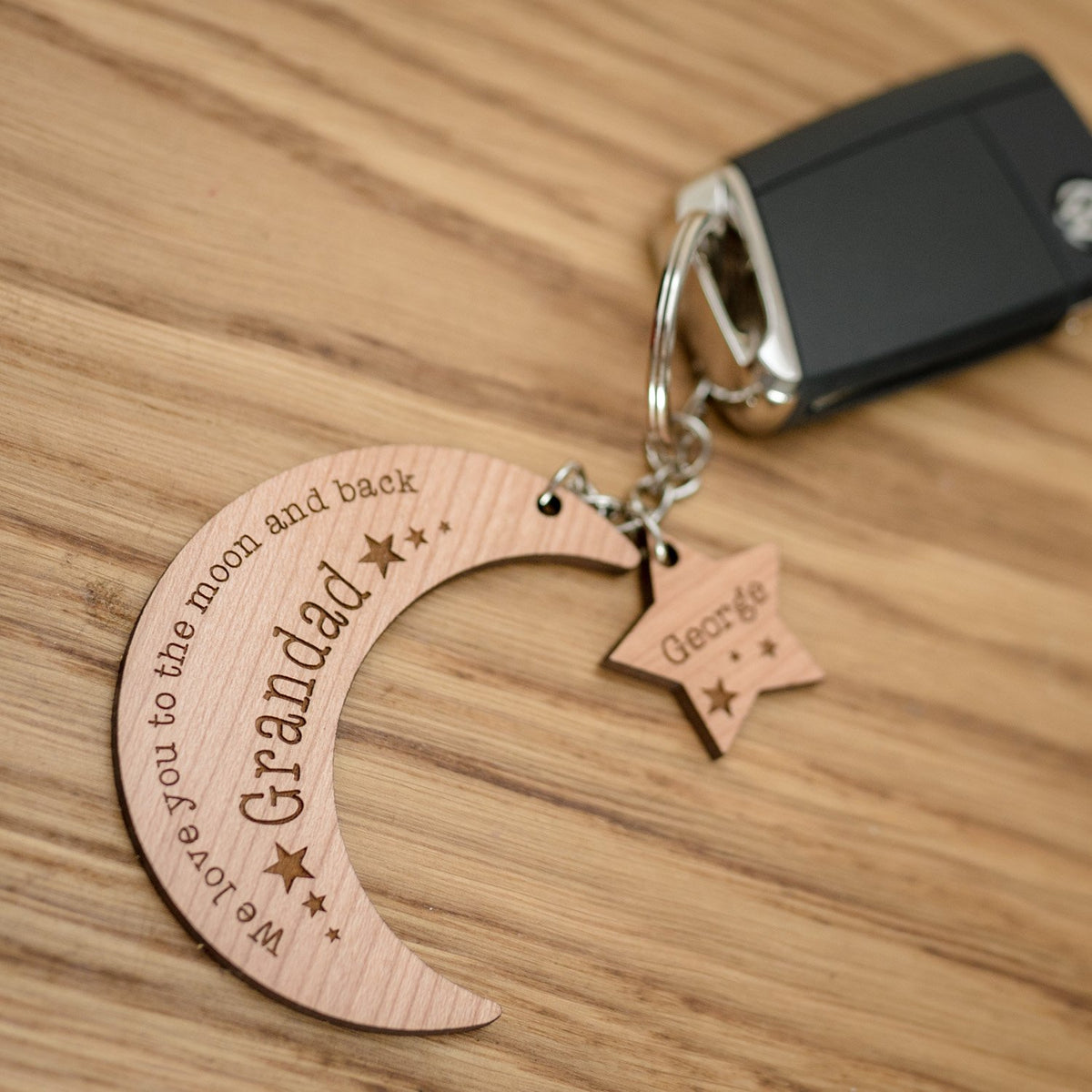 &#39;We love you to the moon and back&#39; Moon &amp; Star Keyring