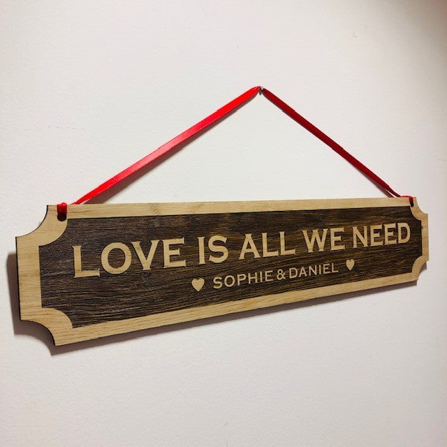 &#39;Love is all we need&#39;&#39; Hanging Plaque
