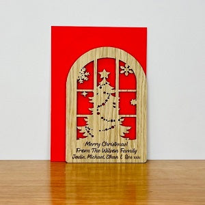 Carte de Noël en bois de fenêtre d&#39;arbre de Noël